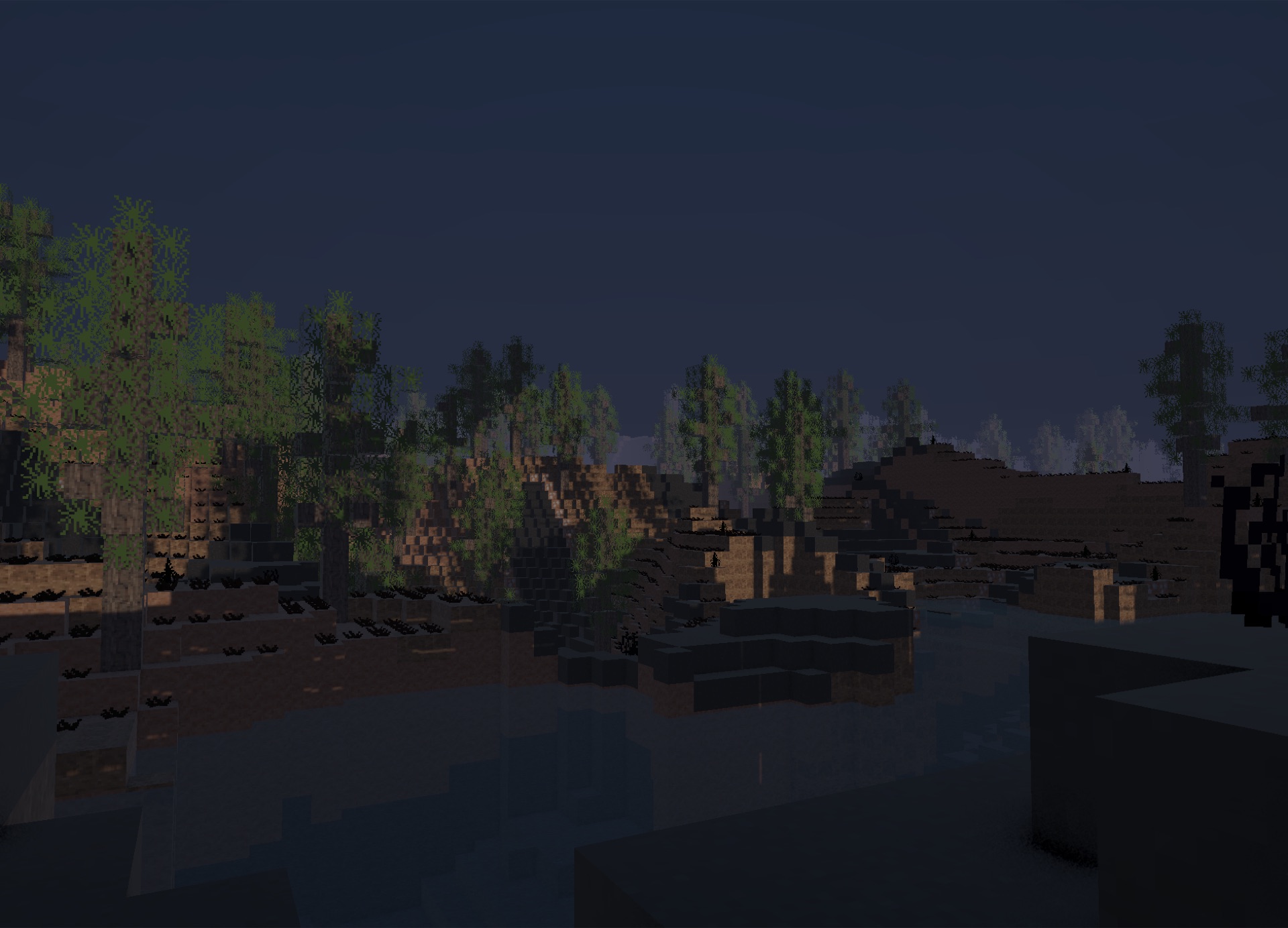 Colinas voxel al anochecer junto a un lago, con sombras largas